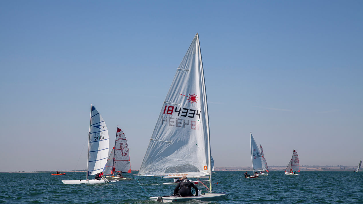 wide shot of a dinghy race